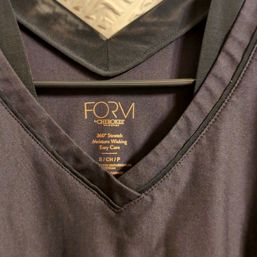 Form small black scrub top